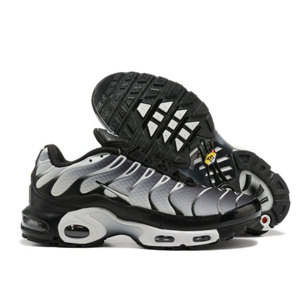 Gray and silver Nike Air Max Plus-style sneakers with black panels and white midsole.
