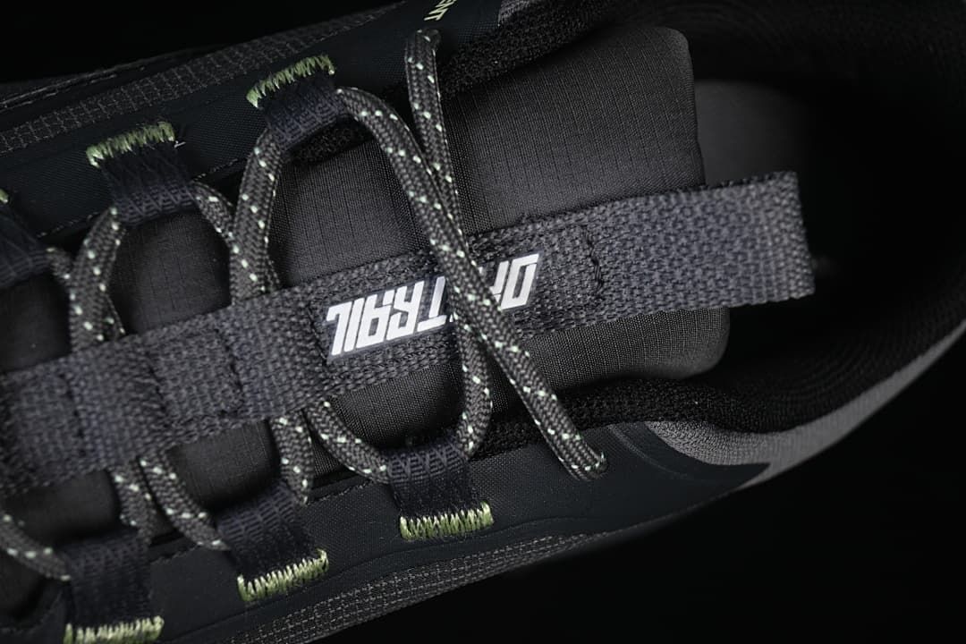 Close-up of lace webbing and patterned shoelaces