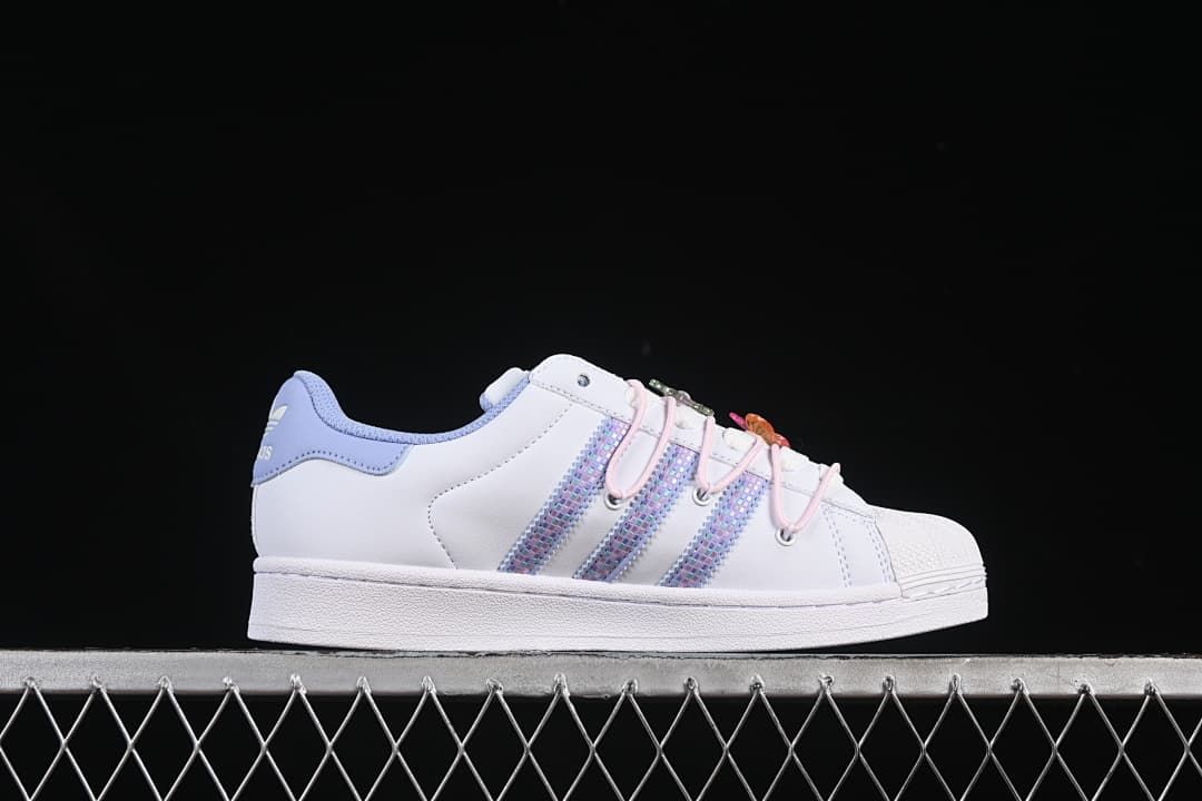 Side profile showing the white upper and pastel patterned stripes
