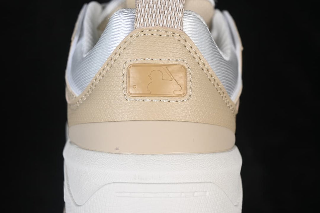 Rear detail of the sneaker with MLB mark and heel pull tab
