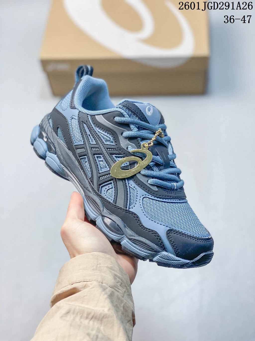 Side view of a blue-gray ASICS GEL-NYC RGD sneaker