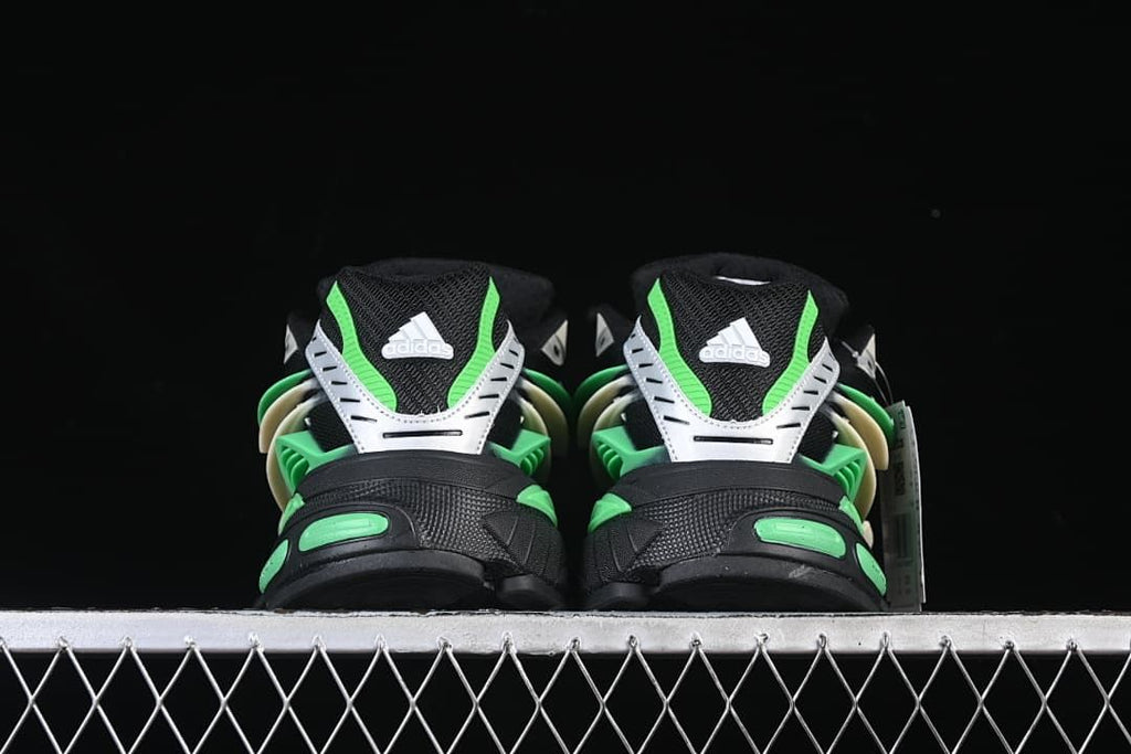 Rear view of the pair showing heel panels and green accents