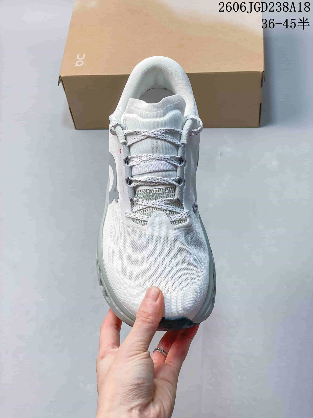 Top view showing the laces, tongue and white upper
