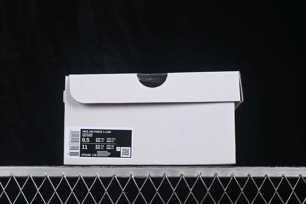White shoebox with a product label displaying Nike Air Force 1 Low, style code DF0188-148 and size information.