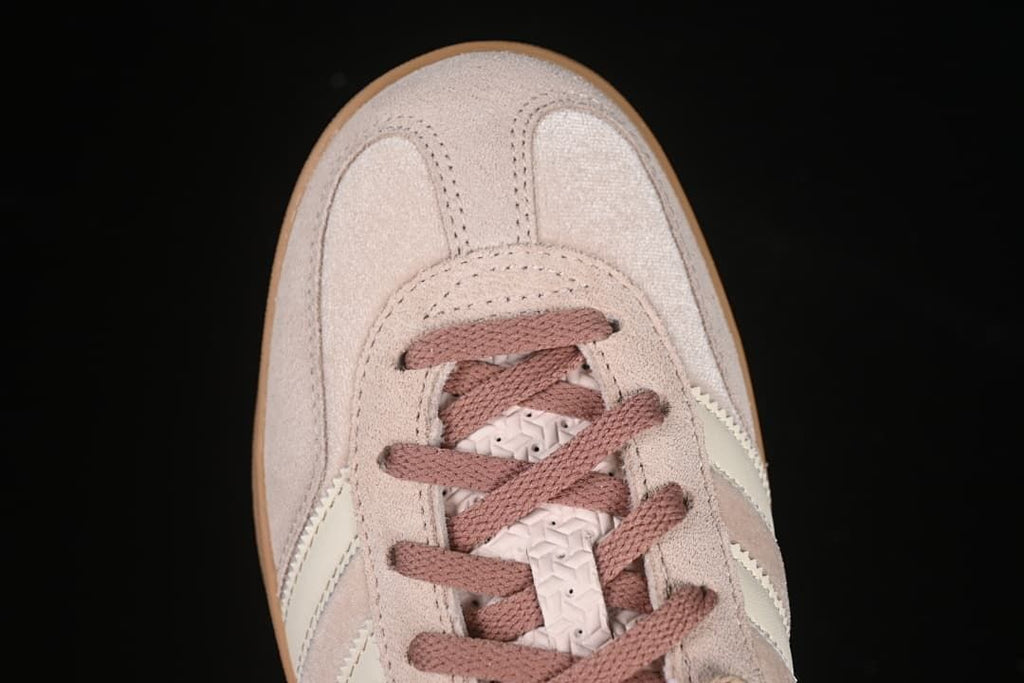 Top-down close-up of the sneaker toe and laces