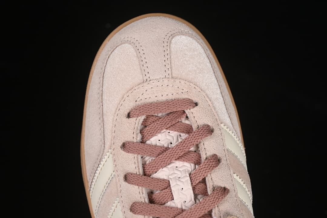 Top-down close-up of the sneaker toe and laces