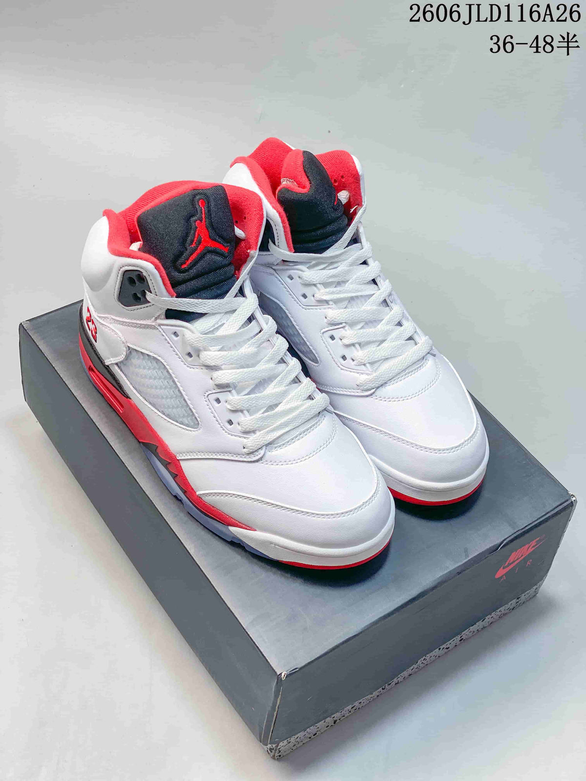 Pair of white high-top sneakers with red and black accents