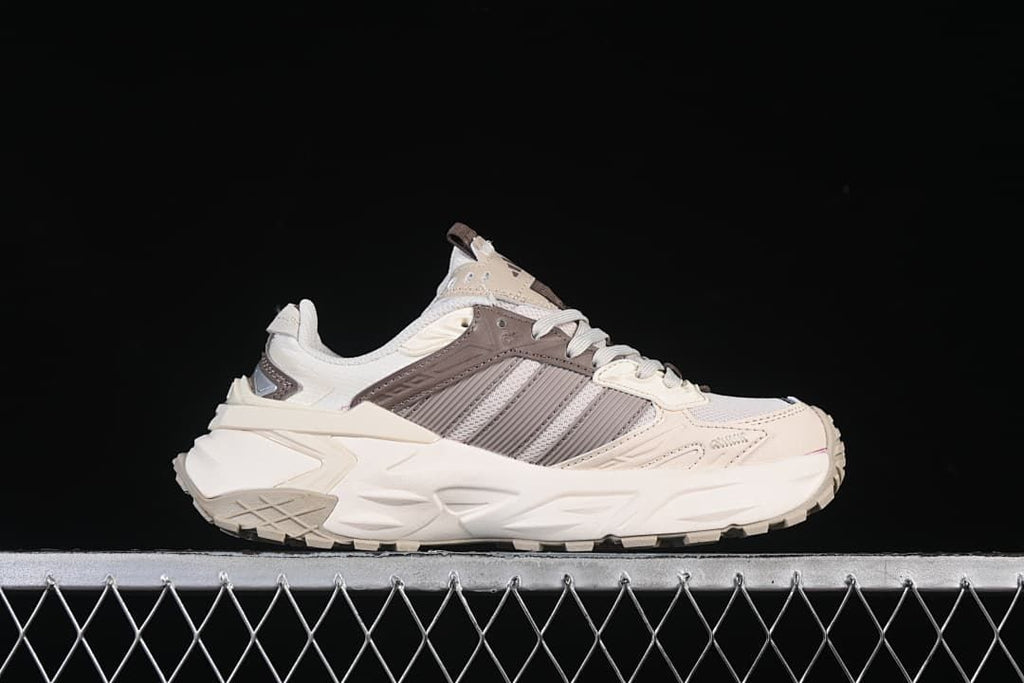 Side profile of the sneaker with a chunky sculpted sole.