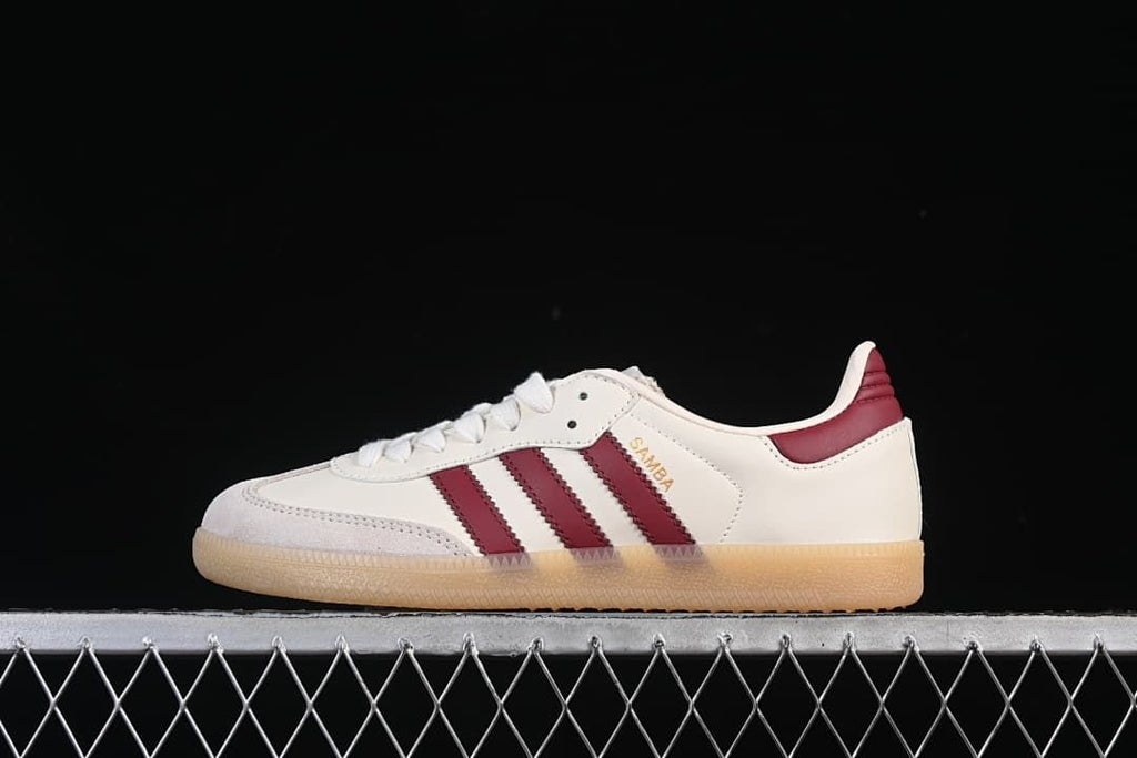 Side view of a cream Samba sneaker with burgundy stripes and gum-colored sole.