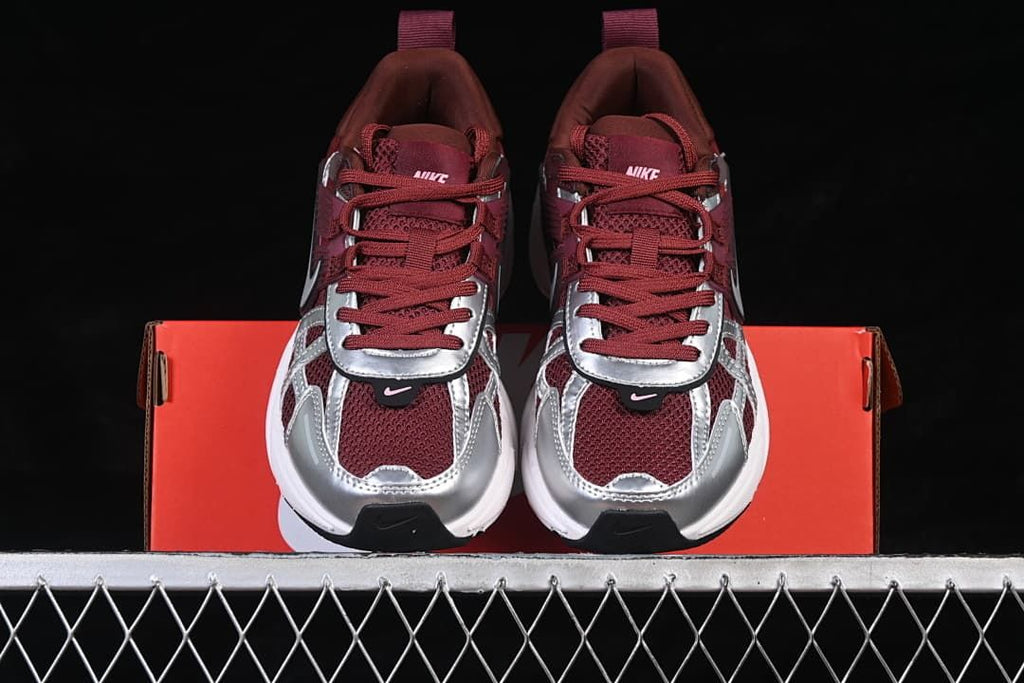 Front view of the pair showing their burgundy mesh and silver overlays