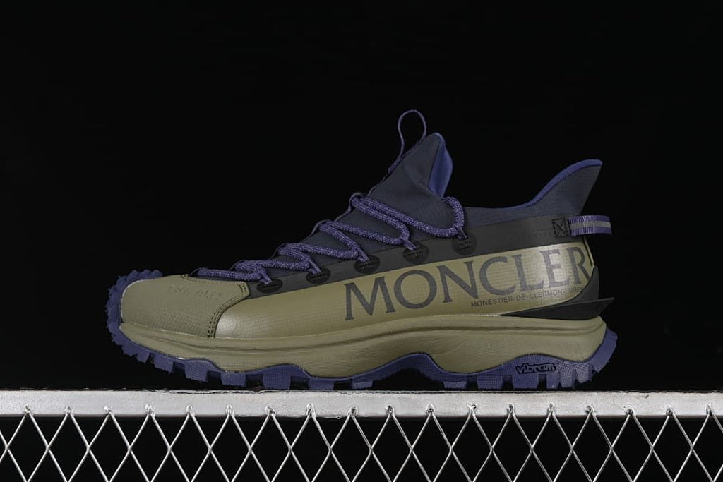 Side view of olive and purple Moncler Trailgrip Lite2 outdoor sneaker