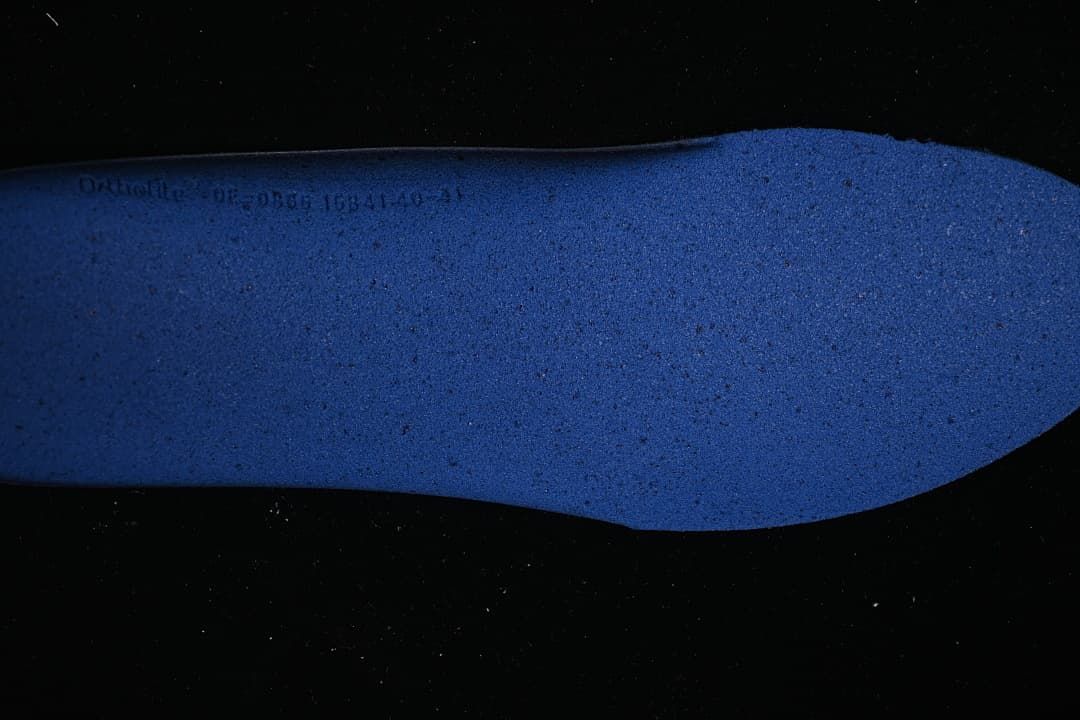 Blue underside of the sneaker insole
