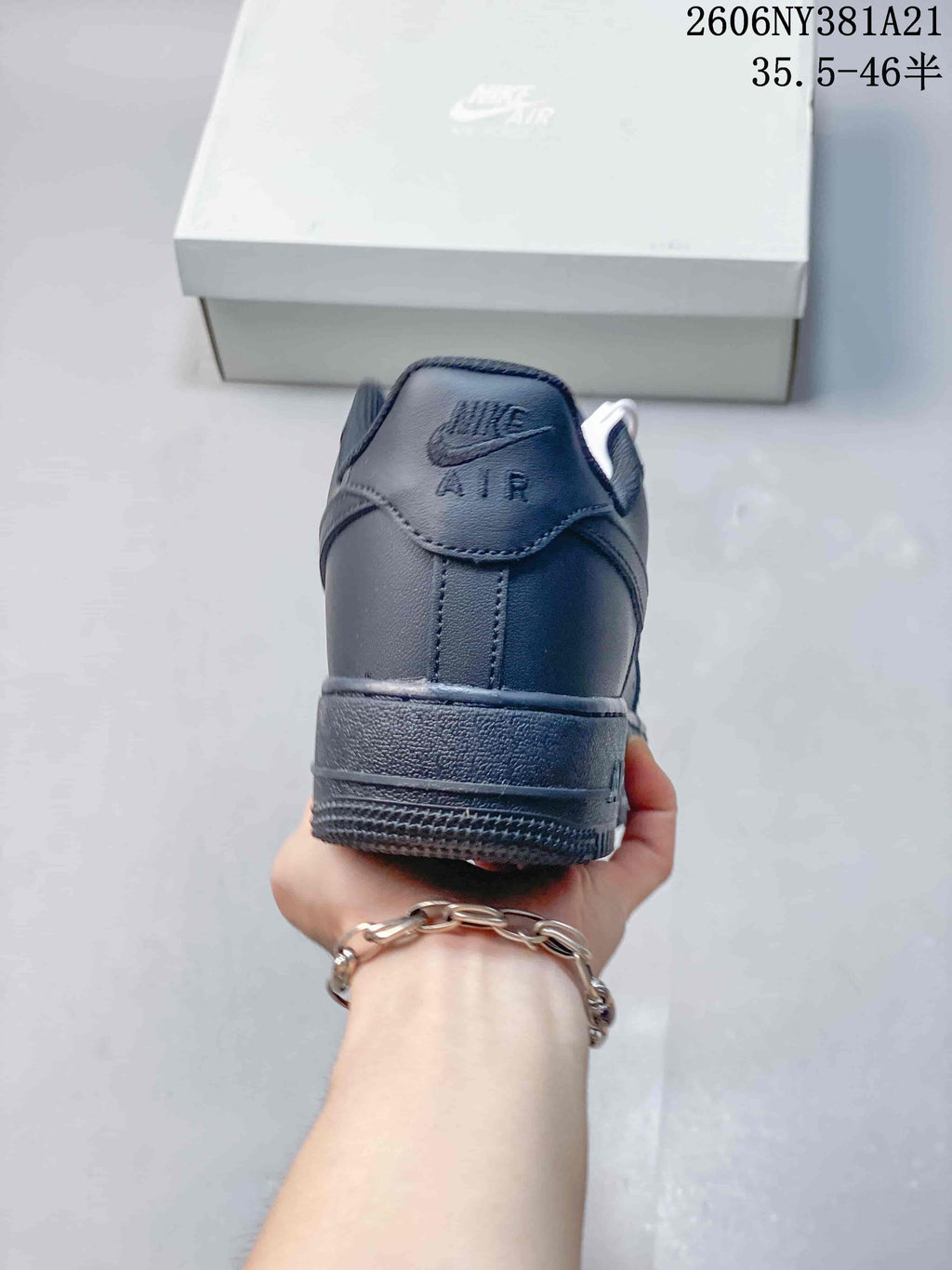 Rear view of a dark blue low-top sneaker