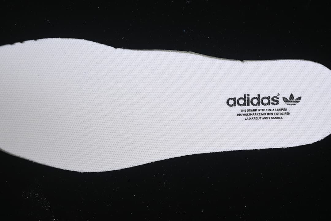 White adidas-branded insole shown from above.