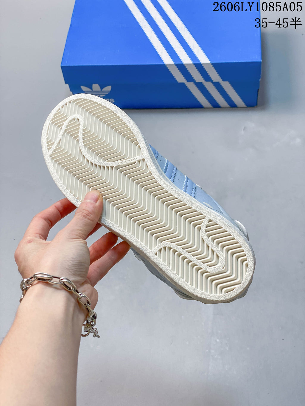 Close-up of the textured outsole and herringbone-style tread