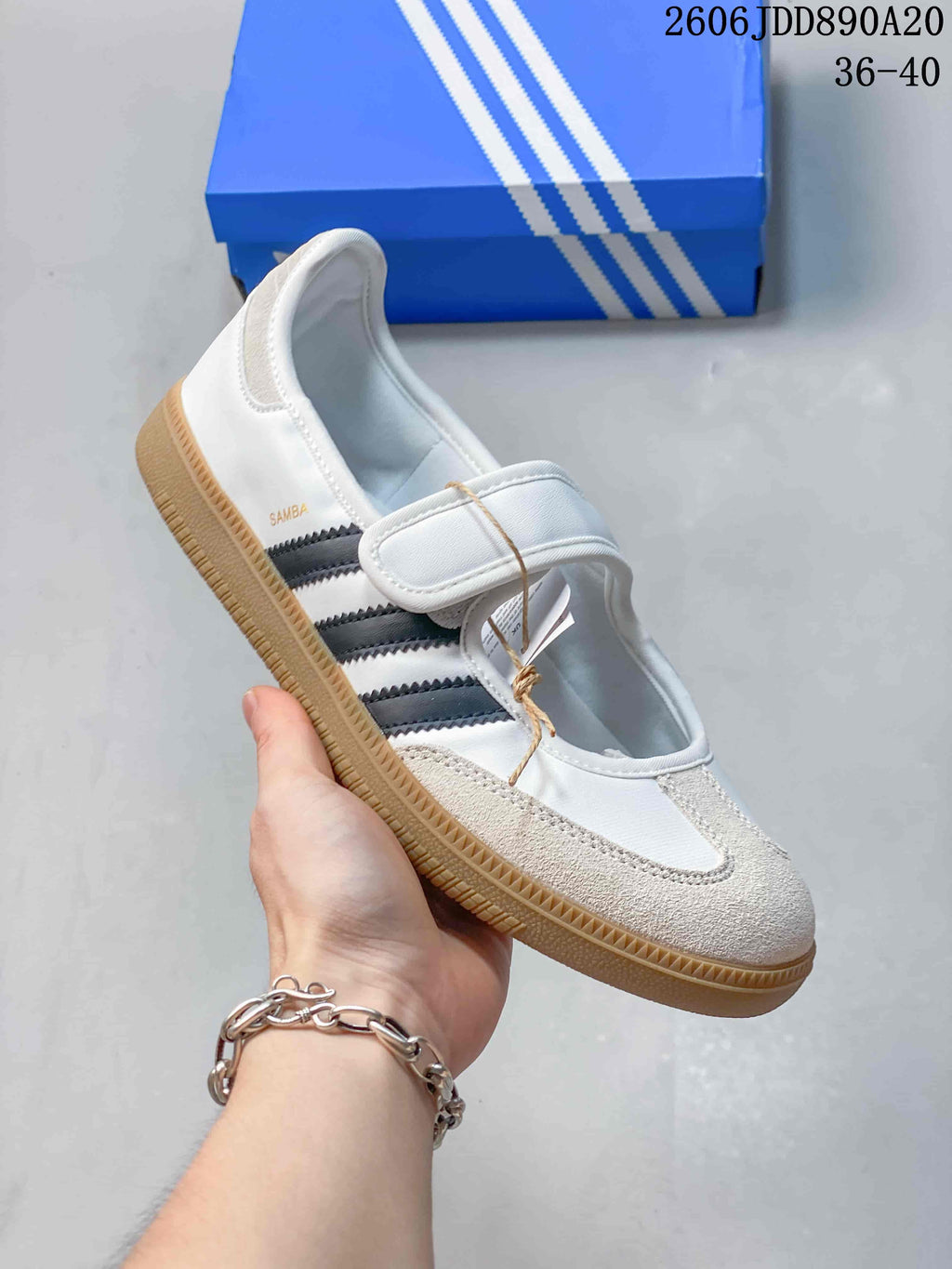 Angled view of the Samba Jane showing its strap, dark side stripes, toe overlay, and gum-colored sole.