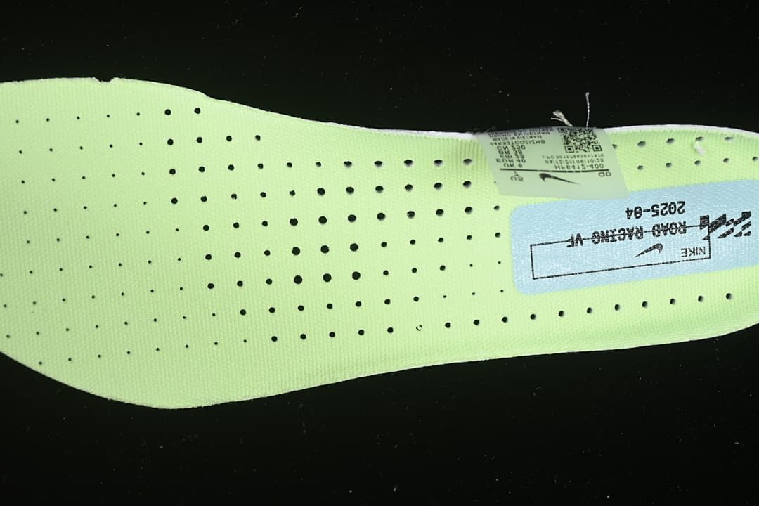Bright insole with printed shoe branding and label