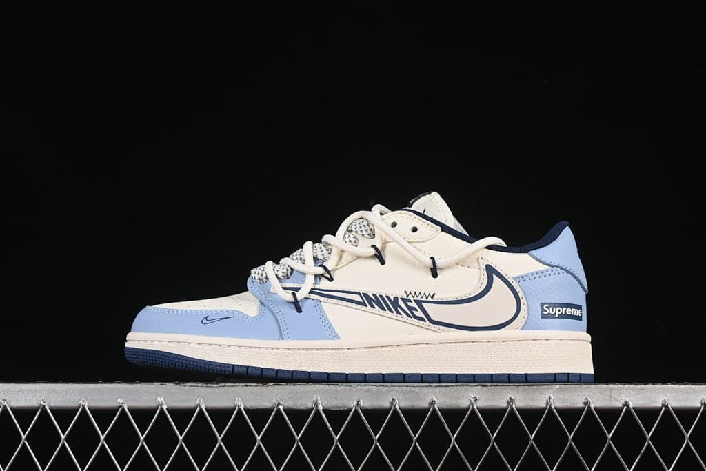 Side view of an off-white and light blue low-top sneaker with navy accents, patterned laces, and visible Supreme branding.