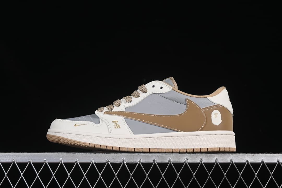 Side view of a grey, off-white, and tan low-top sneaker with a large tan side swoosh.