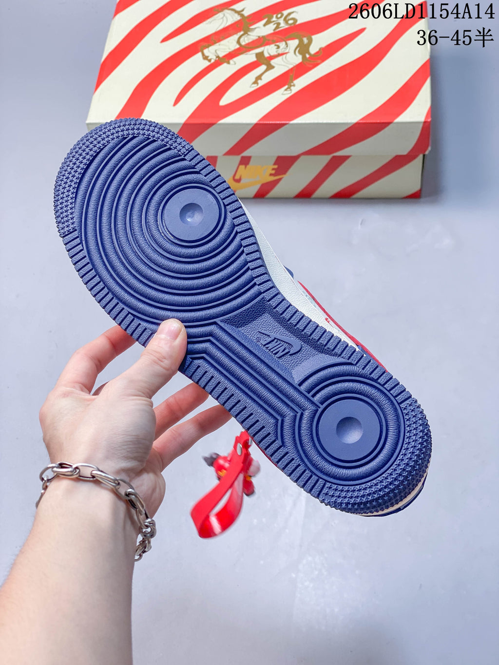 Blue outsole showing the circular tread pattern
