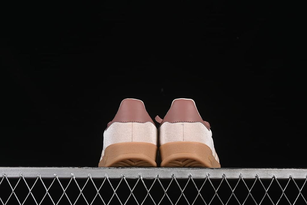 Rear view of the pair showing heel tabs and gum-colored soles