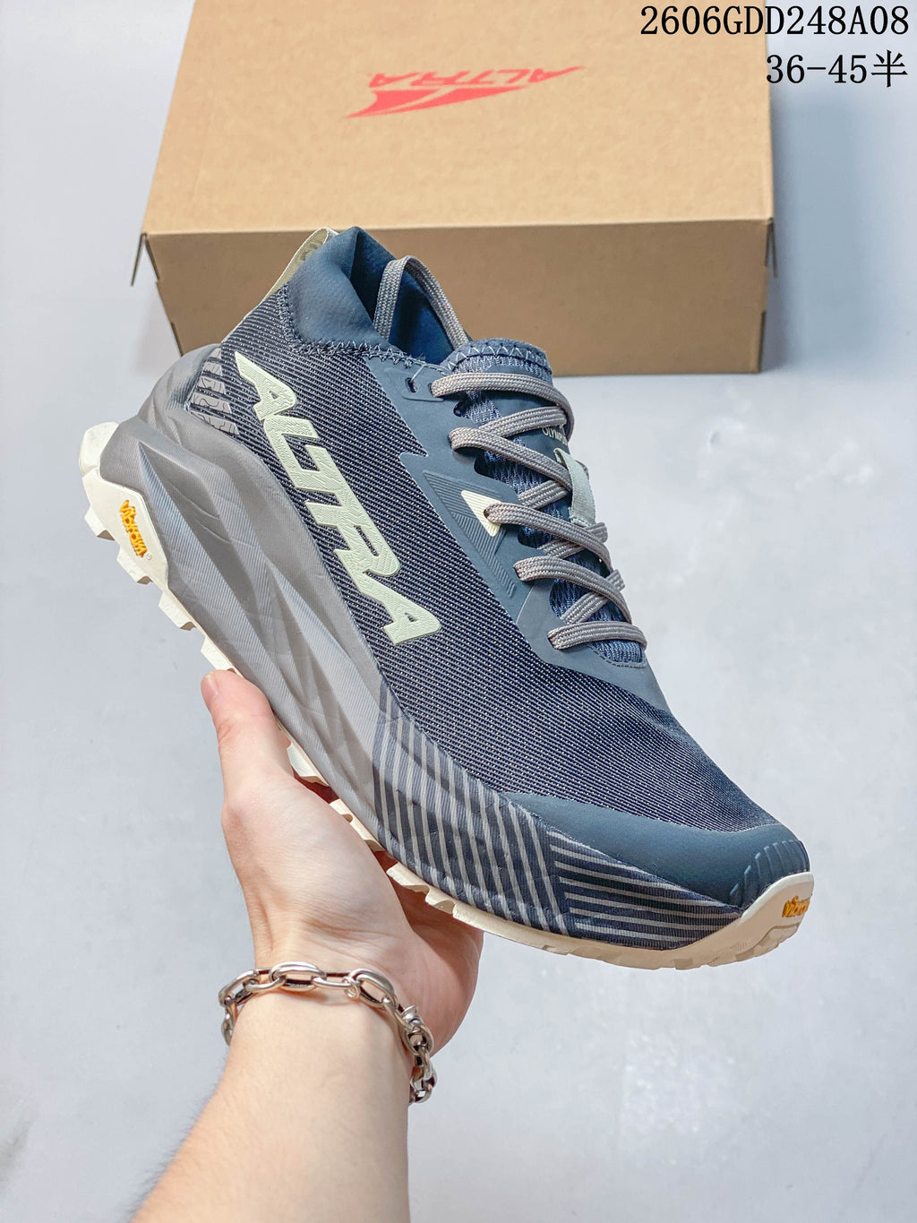 Angled side view of a blue-gray Altra Olympus 275 running shoe