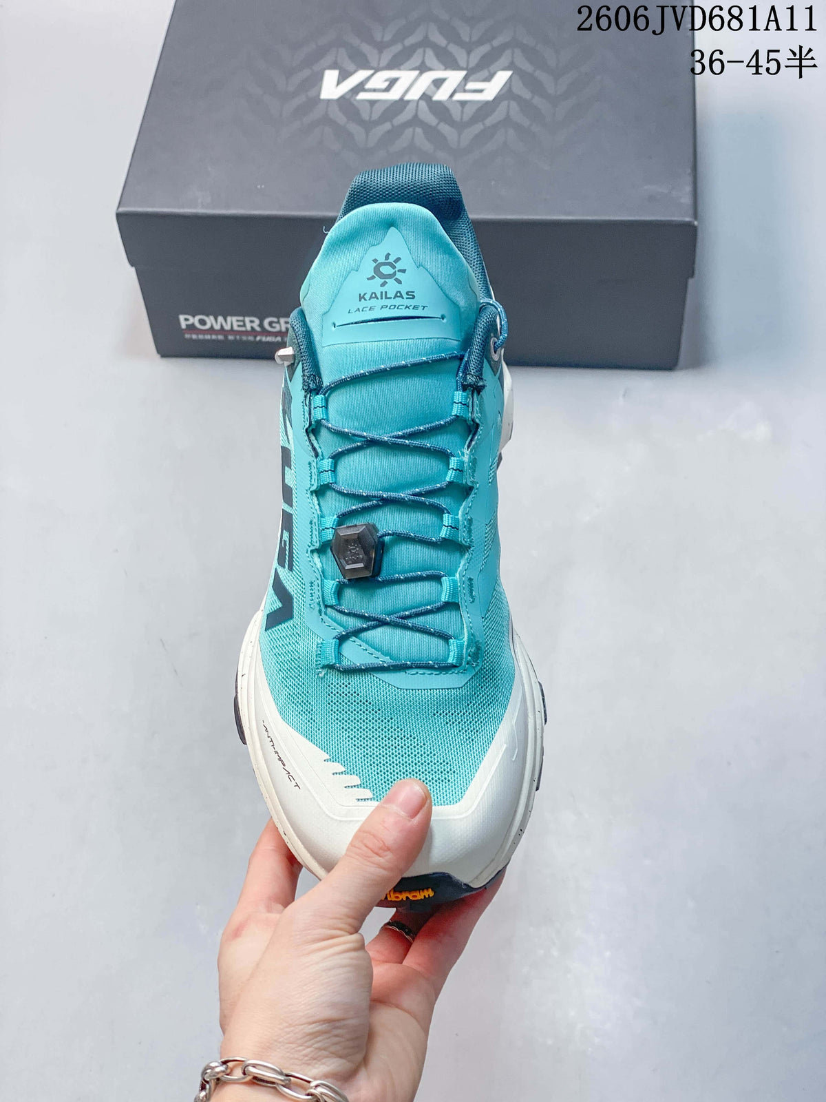 Front view highlighting the mesh-like upper and dial-adjustable laces.