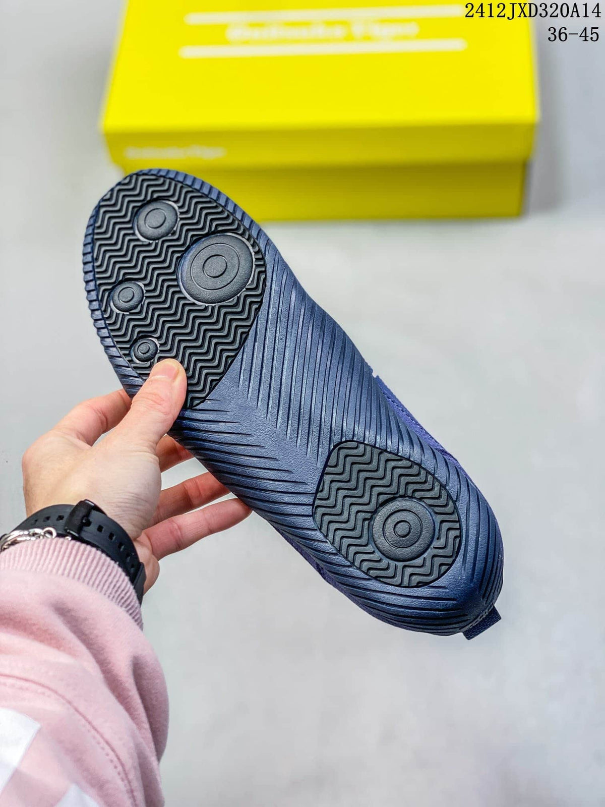 Close-up of the sneaker outsole showing its patterned tread