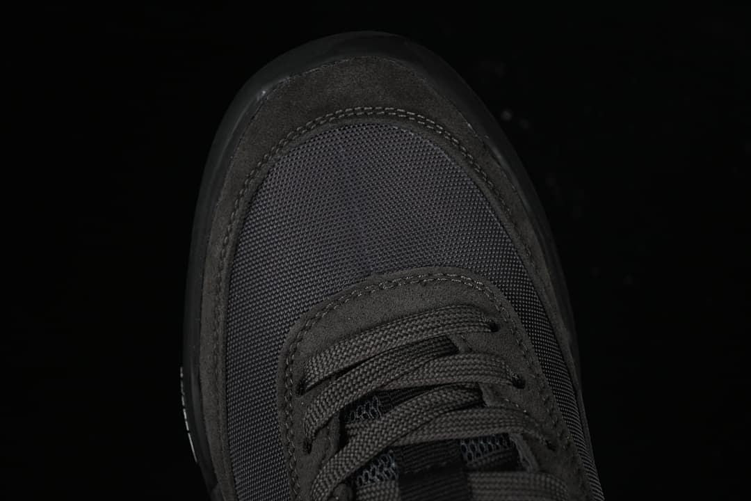 Top view of the dark mesh toe and laces