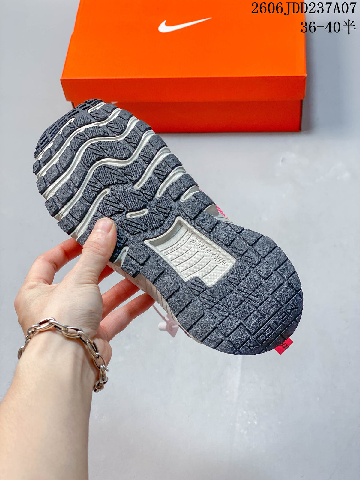 Close-up of the dark, patterned outsole with light-colored grooves.