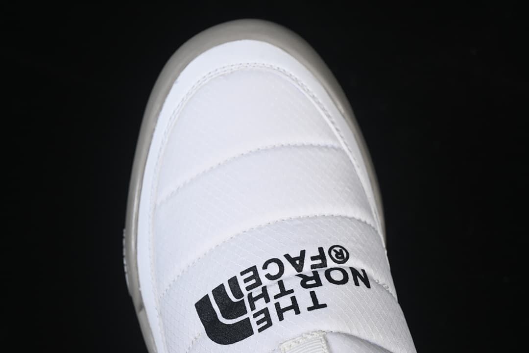 Top view showing the white padded upper and The North Face logo