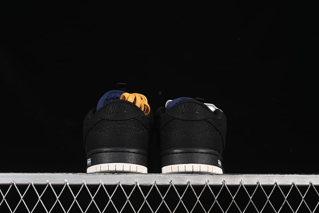 Rear view of both sneakers showing black heel panels and light-colored outsoles
