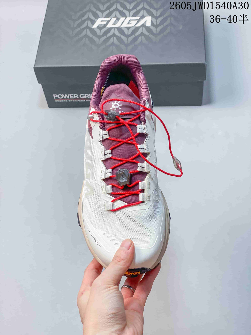 Top view of the red quick-adjust lacing system on a KAILAS FUGA EX3 BOA shoe