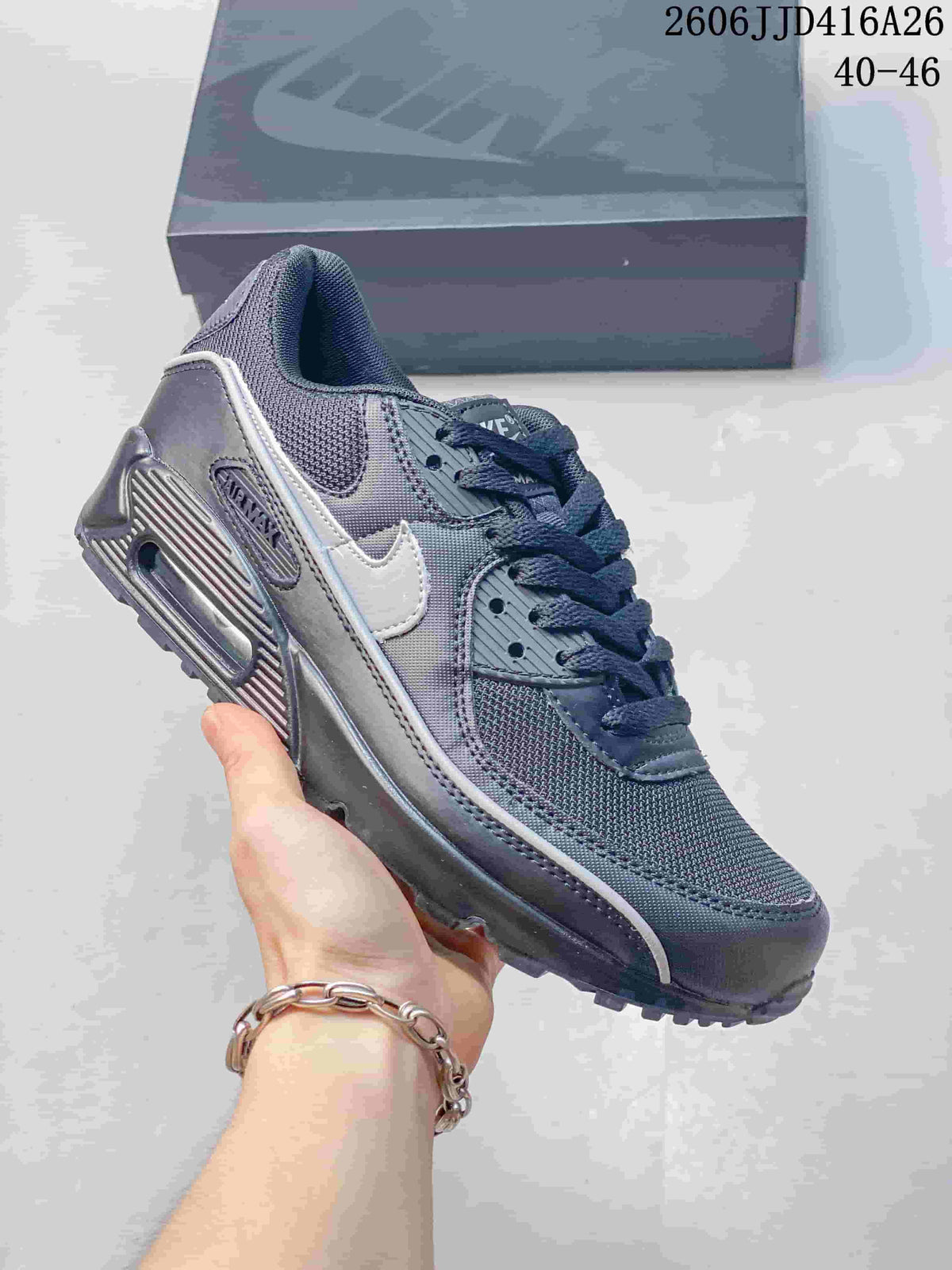 Charcoal and gray Nike Air Max 90 sneaker with a light-colored Swoosh.
