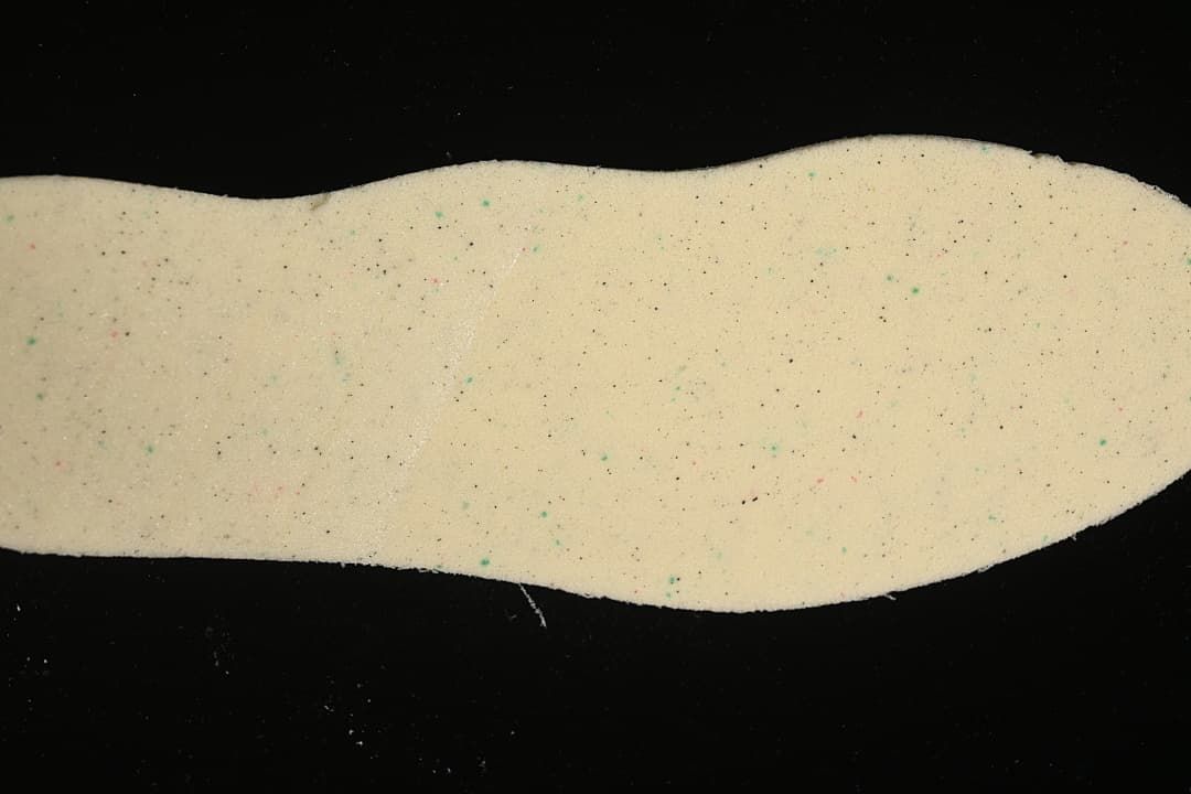 Close-up of a light-colored shoe insole.