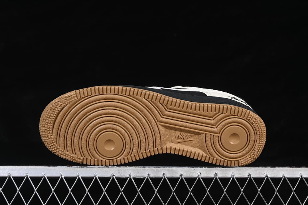 Underside view of the gum-colored patterned outsole