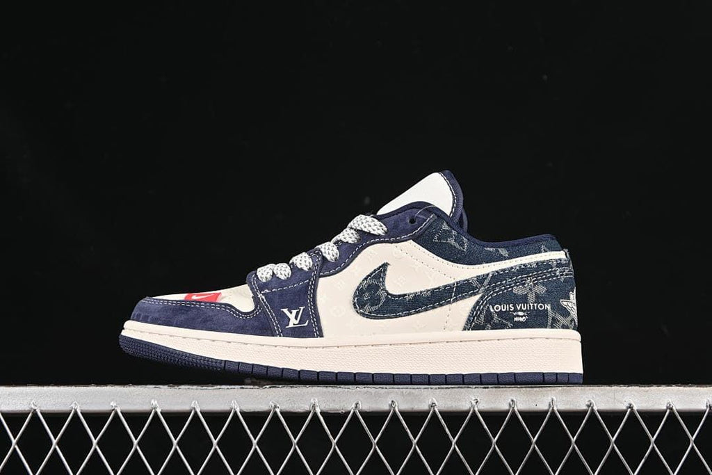Side view of a navy and off-white low-top sneaker with denim-style panels and logo details
