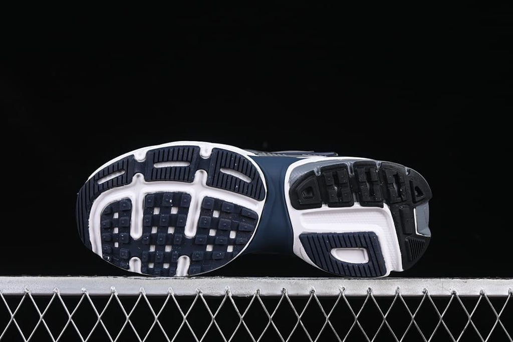 Underside view showing the patterned rubber outsoles