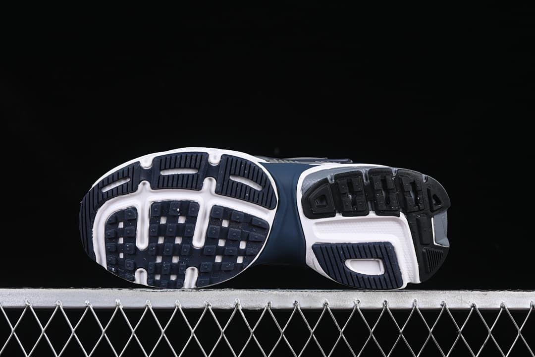 Underside view showing the patterned rubber outsoles