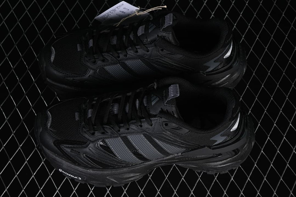 Pair of black sneakers shown from above