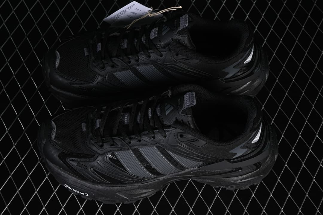 Pair of black sneakers shown from above