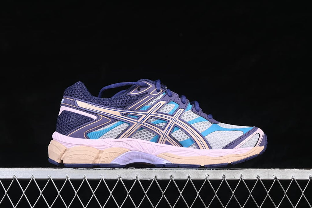 Side profile of one sneaker showing its layered design and multicolor panels.