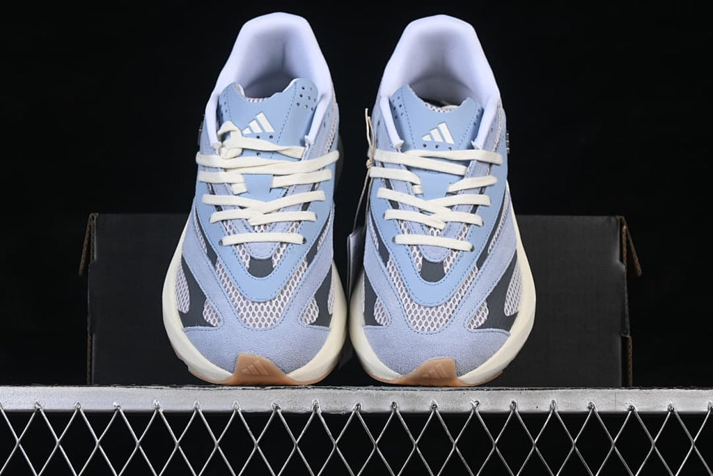Front view of the pair showing the mesh toe panels and layered design
