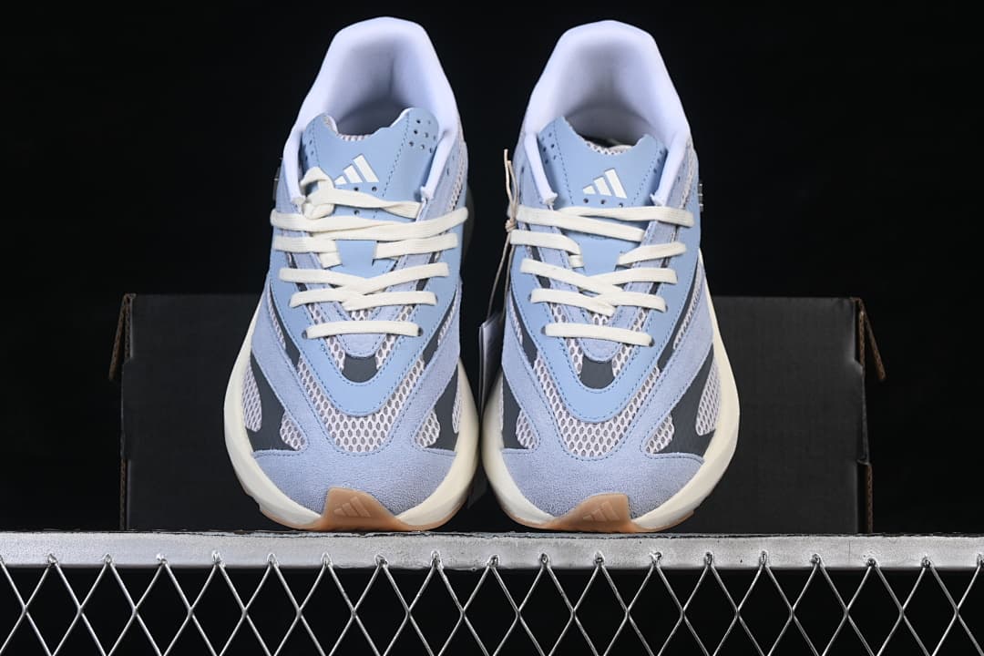 Front view of the pair showing the mesh toe panels and layered design
