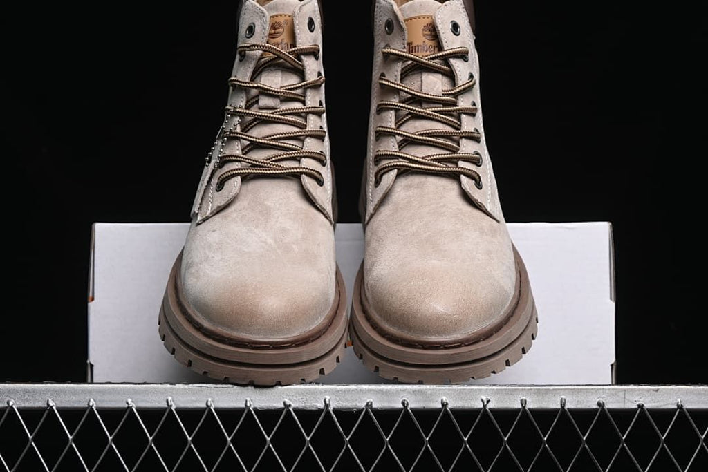 Front view of the pair showing their lace-up fronts and rounded toes