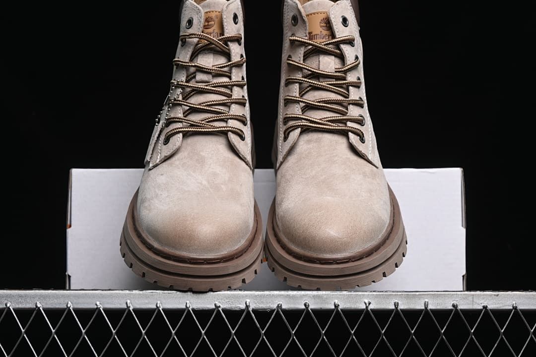 Front view of the pair showing their lace-up fronts and rounded toes