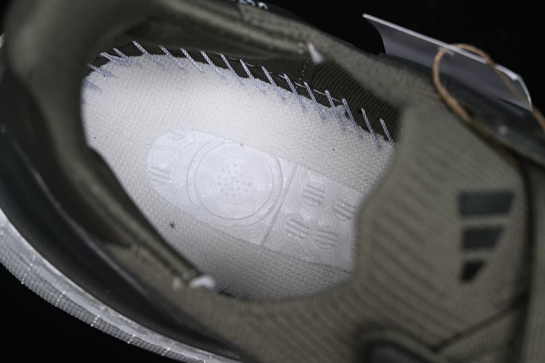 Close-up of the shoe’s interior construction and side detailing