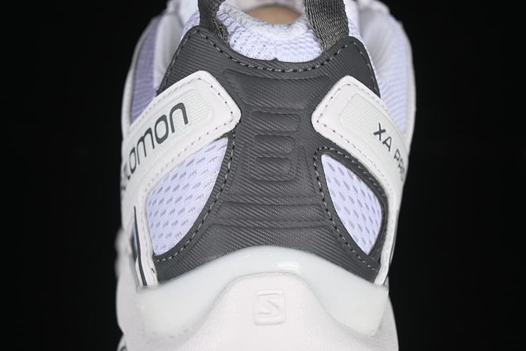 Rear view of the shoe showing heel panels and pull tab