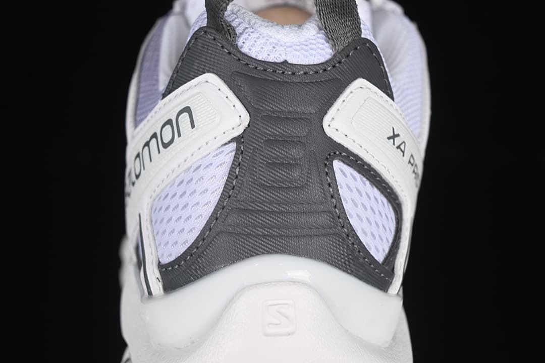 Rear view of the shoe showing heel panels and pull tab