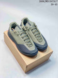 Pair of muted green Arc'teryx Konseal low-top shoes on a box; image overlay shows sizes 39–45.